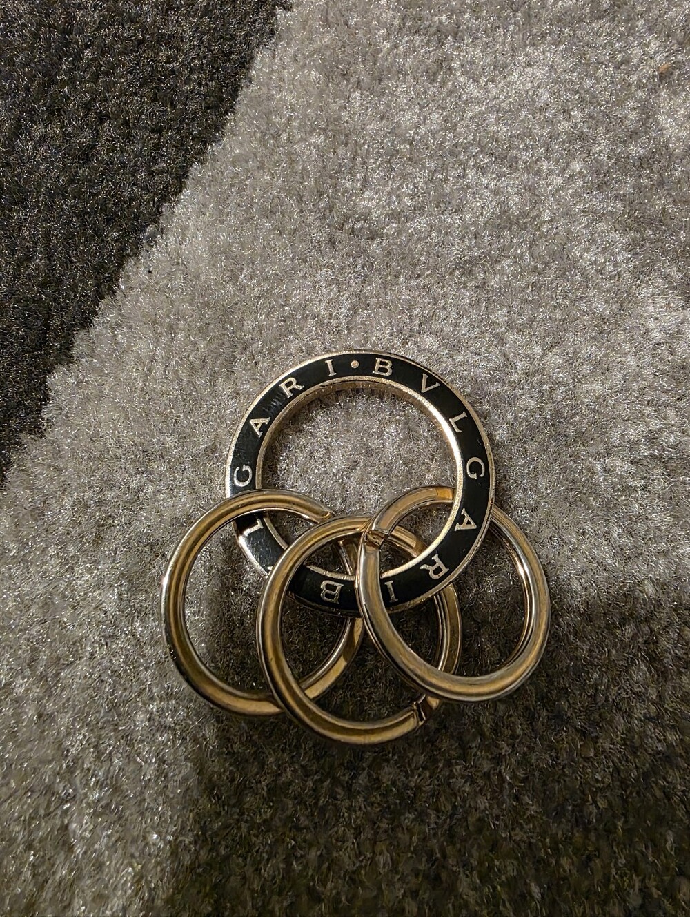 Bulgari Black and Gold Interlocking Ring Key & Card Holder